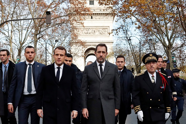 France's President Emmanuel Macron, France's Interior Minister Christophe Castaner and Paris police Prefect Michel Delpuech arrive to visit firefighters and riot police officers the day after a demonstration, in Paris, France December 2, 2018. PHOTO: REUTERS