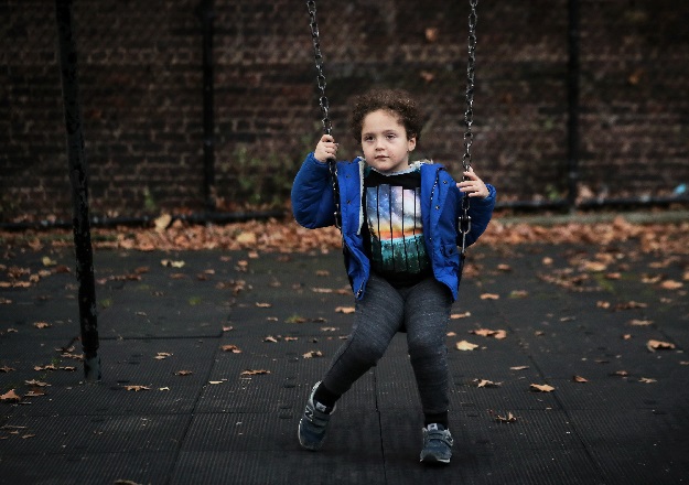  Natan, the son of Reuters' US Health Editor Michele Gershberg, sits on a swing in a park in Brooklyn, New York City, US. PHOTO: REUTERS