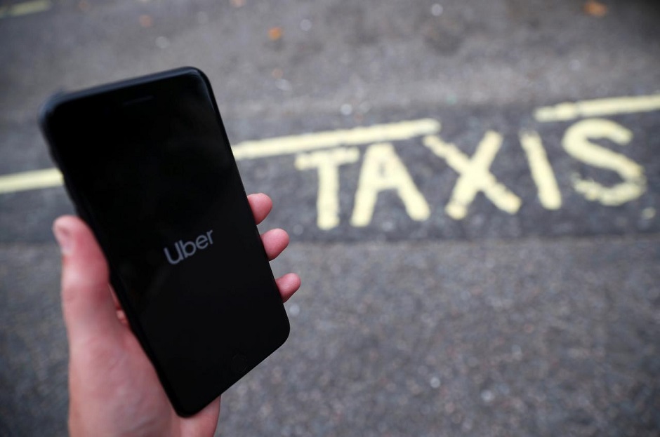 The Uber application is seen on a mobile phone in London, Britain, September 14, 2018. REUTERS/Hannah McKay