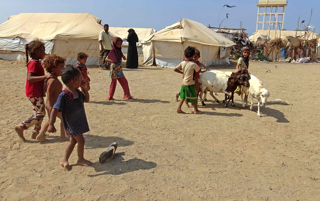 Yemeni children play at a camp for displaced people in the Khokha district of the western province of Hodeidah on December 11, 2018. PHOTO: AFP
