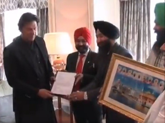 Representatives of Sikh community meet the visiting premier in Qatar. PHOTO: PTI/TWITTER