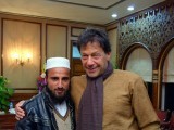 Irfanullah, polio worker, with Prime Minister Imran Khan. PHOTO: EXPRESS