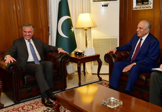 FM Qureshi with US envoy Khalizad at FO. PHOTO: EXPRESS