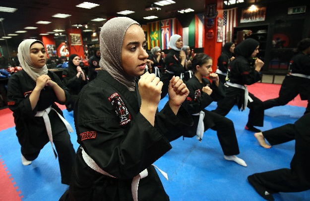 Kuwaiti women practise hybrid martial art Kajukenbo in a club in Kuwait City. PHOTO: AFP