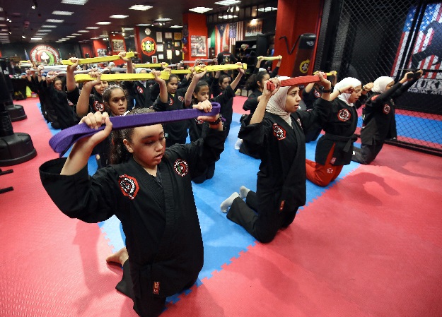 Kuwaiti women practise hybrid martial art Kajukenbo in a club in Kuwait City. PHOTO: AFP
