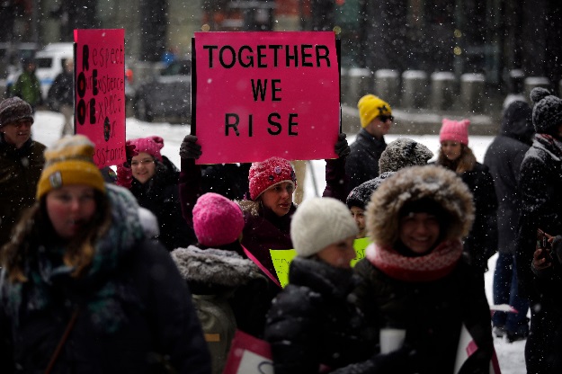 Demonstrators hold signs during the Young Women's March at Federal Plaza on January 19, 2019 in Chicago, Illinois. PHOTO: AFP