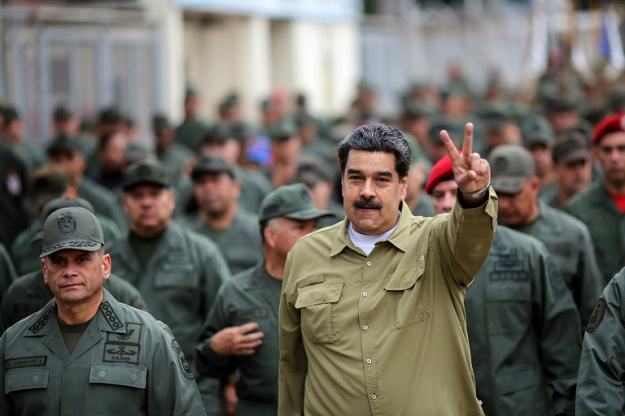 Venezuela's President Nicolas Maduro sought to rally support from the military in Caracas. PHOTO: AFP