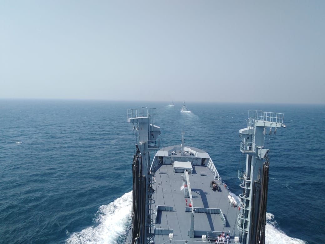 PNS Aslat and PNS Saif take position in front of PNS Moawin during Aman-19.