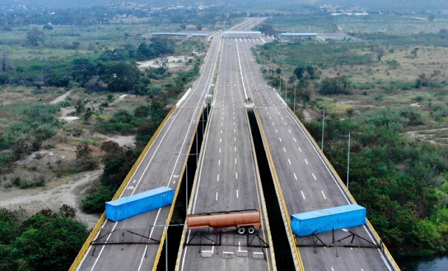 venezuelan troops blocked tienditas bridge on the colombia border with containers to stop a humanitarian aid shipment from reaching the capital photo afp