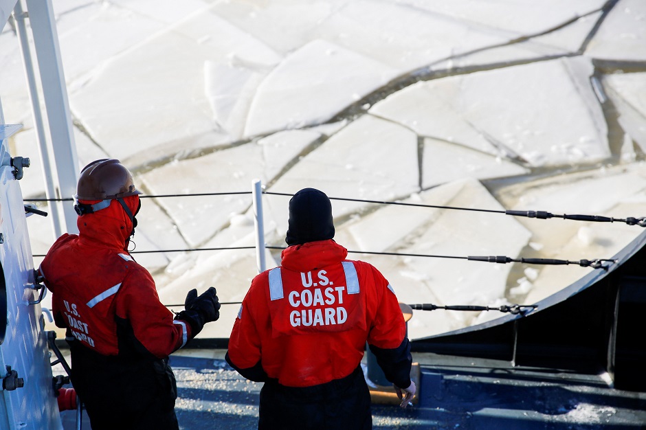 US Coast Guard members work on a boat used as an ice breaker along the Hudson river between the towns of Kingston and Poughkeepsie during a polar vortex in New York. PHOTO: REUTERS