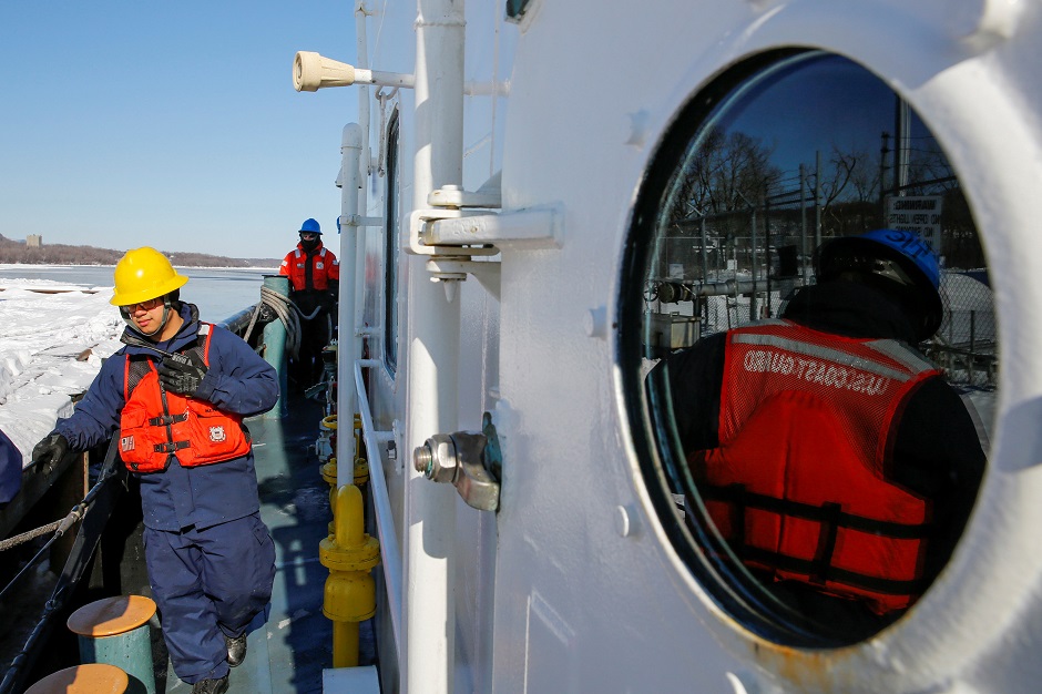 US Coast Guard workers continue to work along the Hudson river between the towns of Kingston and Poughkeepsie. PHOTO: REUTERS