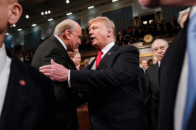 US President Donald Trump greets people as he arrives to deliver the State of the Union address. PHOTO: AFP