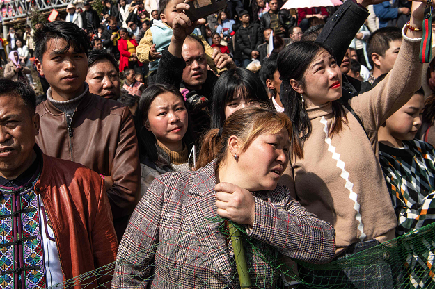 People watching the annual flower festival. PHOTO: AFP