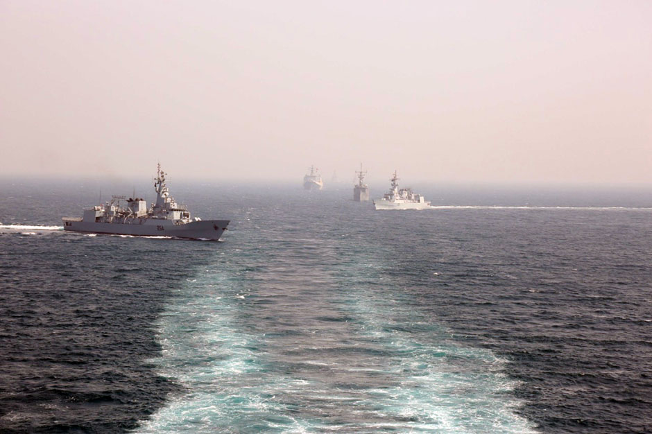 PNS Aslat and PNS Saif followed by a PLAN and Turkish Navy warship during Aman-19.