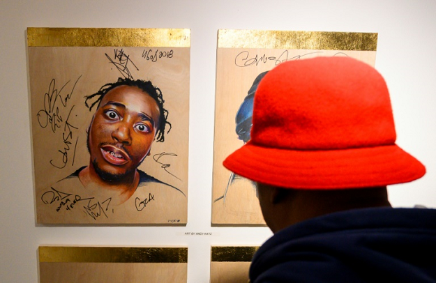 Grandmaster Caz looks at a portrait of late rapper Ol' Dirty Bastard of the Wu-Tang Clan at the hip-hop pop-up museum. PHOTO: AFP