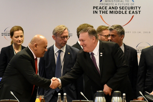 Yemen's Foreign Minister Khalid al-Yamani (left) shakes hands with US Secretary of State Mike Pompeo before a session at the conference on Peace and Security in the Middle East in Warsaw. PHOTO: AFP