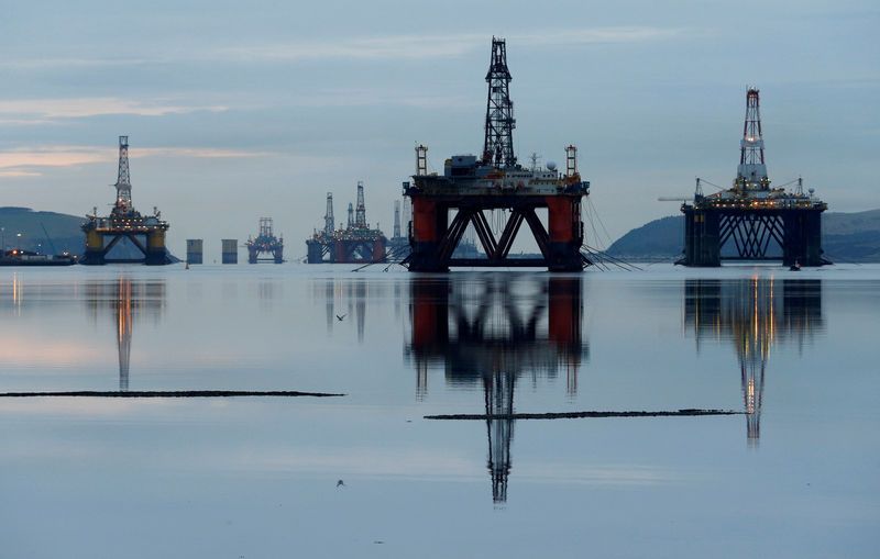 Oil firms as Saudis trim exports, US output forecast reduced