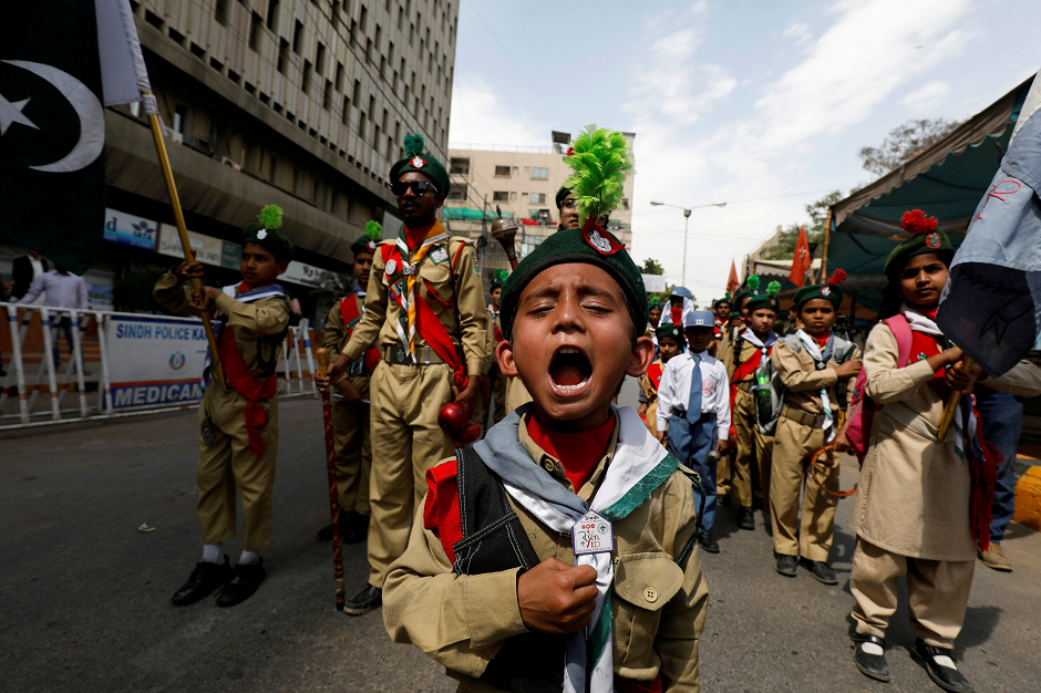 A Pakistani scout member reacts as he takes part in a march to commemorate the World Civil Defence Day in Karachi, Pakistan March 1, 2019. PHOTO: REUTERS