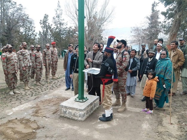 A flag hoisting ceremony held at Quaid-e-Azam Residency in Balochistan's Ziarat district on March 23. PHOTO: EXPRESS