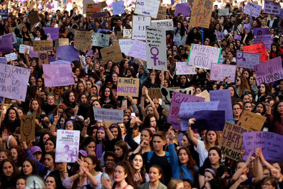Student protesters march during a demonstration marking International Women's Day in Barcelona. PHOTO: AFP