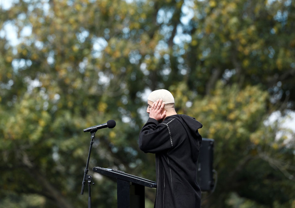 An imam leads a Friday prayer at Hagley Park outside Al-Noor mosque in Christchurch. PHOTO: REUTERS