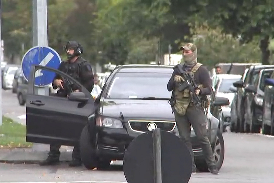 An image grab from TV New Zealand taken on March 15, 2019 shows armed New Zealand special forces arriving outside the mosque following a shooting in Christchurch. PHOTO: AFP