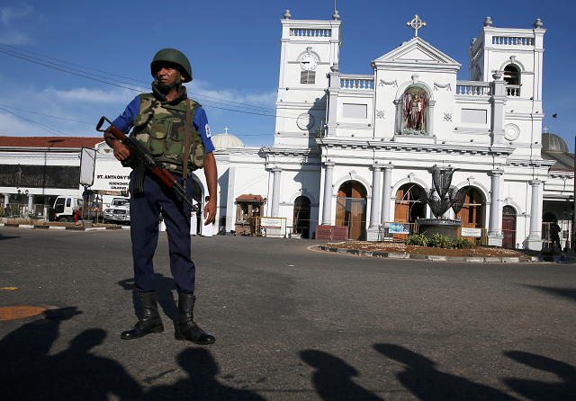 A security officer stands in front of St Anthony's shrine in Colombo. PHOTO: REUTERS