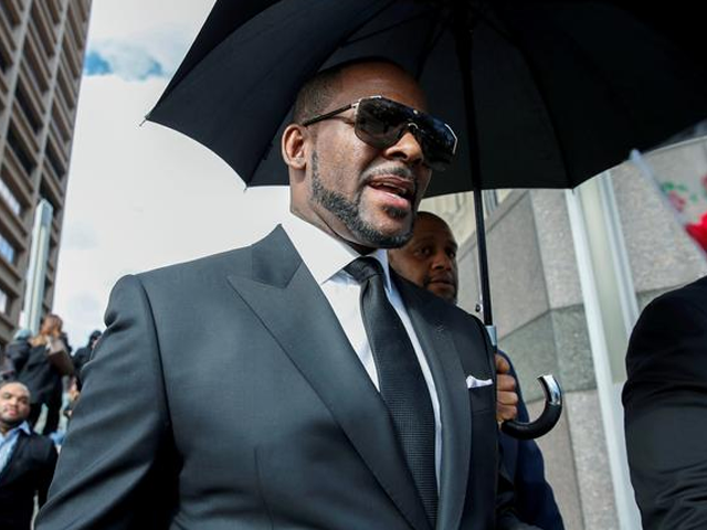 Grammy-winning singer R. Kelly was charged on Thursday with 11 new felony counts of sexual assault and abuse that could, if he is convicted, send the R & B singer to prison for 30 years, the Chicago Sun Times reported. PHOTO: REUTERS