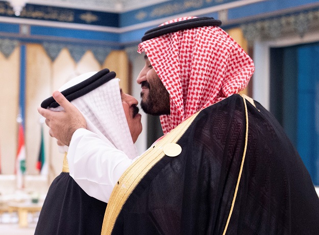 Crown Prince of Saudi Arabia Mohammed bin Salman kisses the forehead of Bahrain's King Hamad bin Isa Al Khalifa during the Gulf Cooperation Council (GCC) summit in Mecca, Saudi Arabia. PHOTO: Reuters