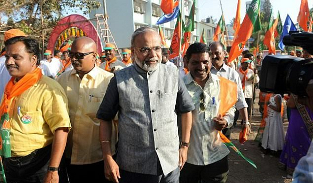 Indian businessman Vikas Mahante, another lookalike of Prime Minister Narendra Modi, was a big draw for crowds on the 2014 campaign trail. PHOTO: AFP