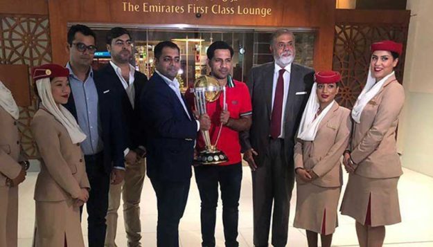 Captain Sarfraz Ahmed poses with the ICC World Cup Trophy