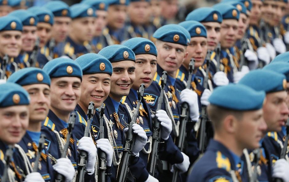 Russian servicemen smile before the Victory Day parade, which marks the anniversary of the victory over Nazi Germany in World War Two, in Red Square in central Moscow. PHOTO: REUTERS