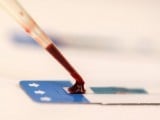 A nurse tests a blood sample. PHOTO: REUTERS