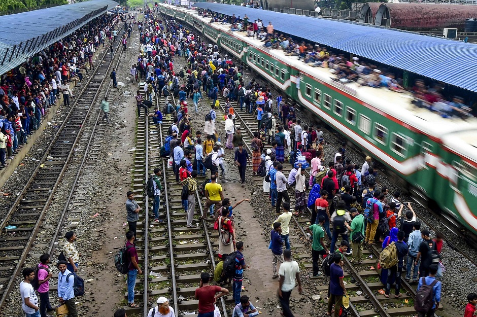 Bangladeshis cram onto a train as they travel back home to meet their families ahead of Eidul Fitr. PHOTO: AFP