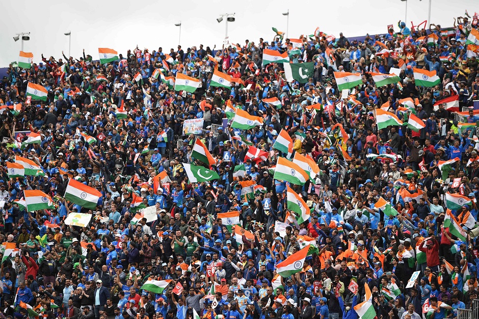 India and Pakistan supporters cheer on their teams. PHOTO: AFP