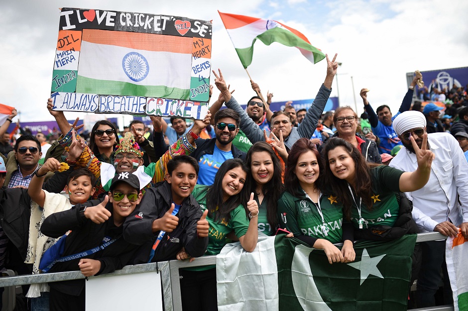 India and Pakistan supporters pose for a photograph. PHOTO: AFP