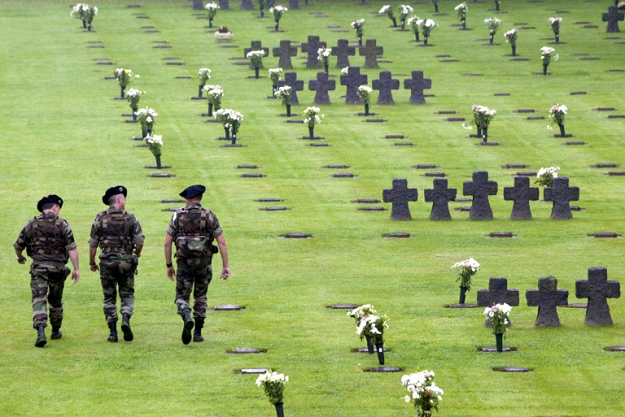 French mountain troops at a German WWII cemetery illustrate how the two former enemies have overcome decades of hostility. PHOTO: AFP
