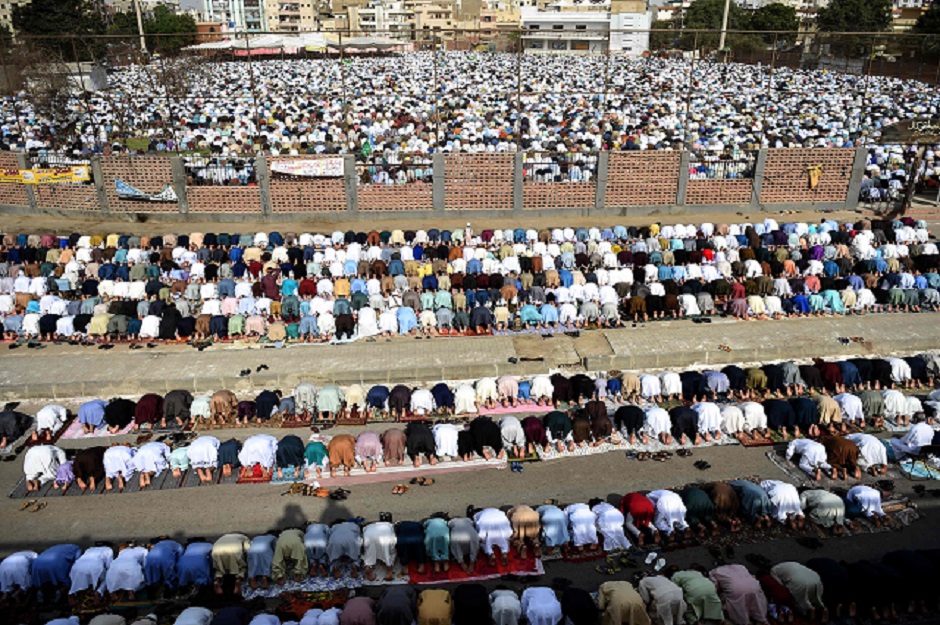 Pakistani Muslims offer prayers during Eid al-Fitr at Eidgah ground in Karachi. PHOTO: AFP