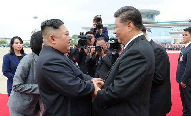 Chinese President Xi Jinping made a highly symbolic visit to the nuclear-armed North this month. PHOTO: AFP