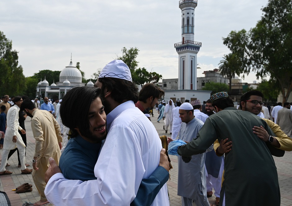 People offer prayers during Eidul Fitr at the Eidgah Sharif Darbar in Rawalpindi. PHOTO: AFP