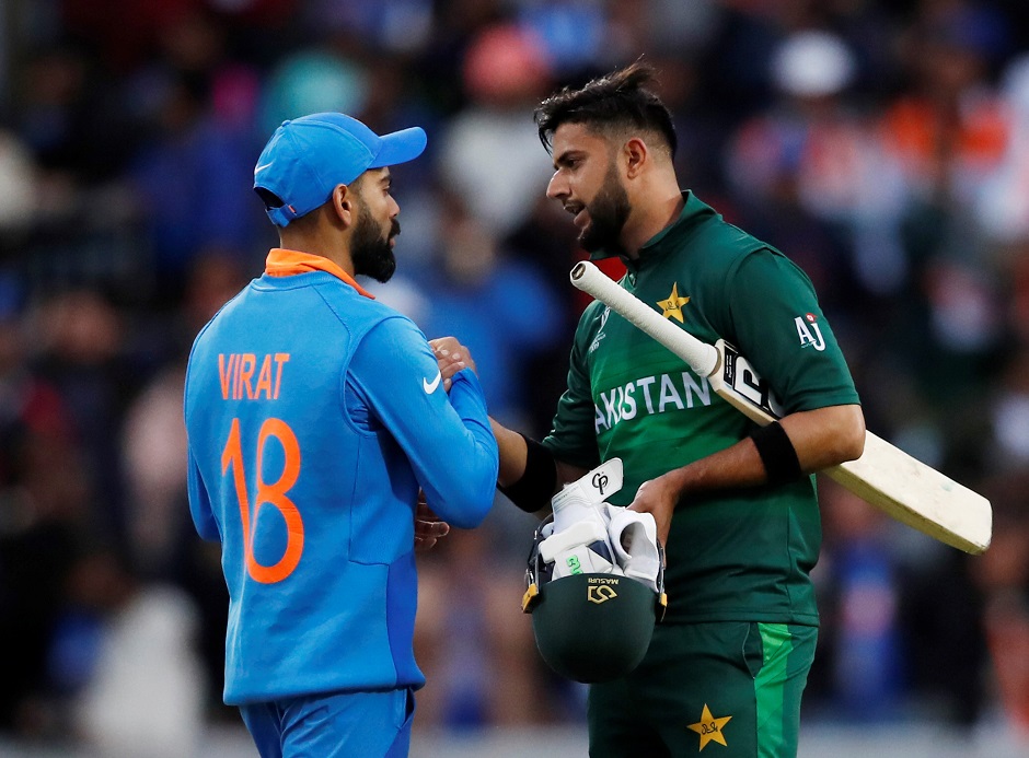 India's Virat Kohil shakes hands with Pakistan's Imad Wasim after the match. PHOTO: REUTERS 