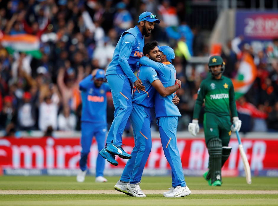 India's Vijay Shankar celebrates the wicket of Pakistan's Imam-ul-Haq with team mates. PHOTO: REUTERS