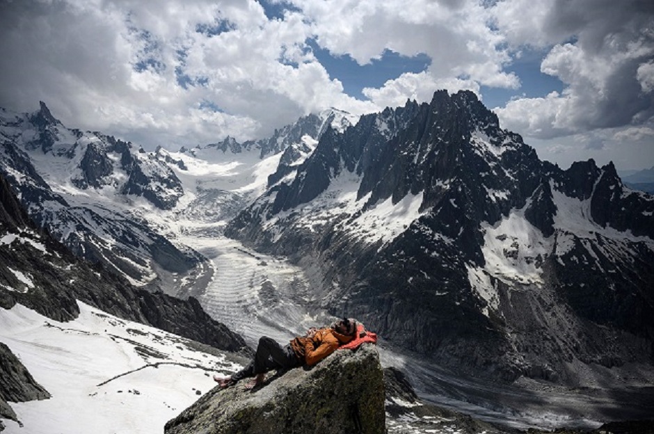 Aspiring Mountain guide Yann Grava takes a rest near the Mer de Glace glacier at the Charpoua Refuge. PHOTO: AFP