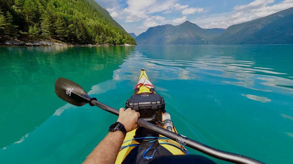 This picture shows a man kayaking on Sognefjord in Norway. PHOTO: AFP