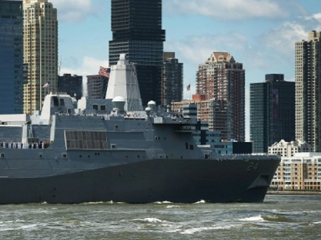 The USS Arlington (pictured May 2018), which transports marines, amphibious vehicles, conventional landing craft and rotary aircraft, will head toward the Gulf after intelligence reports suggested Iran was planning some sort of attack in the region. PHOTO: AFP