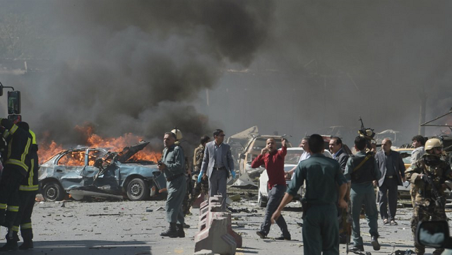 afghan security forces personnel are seen at the site of a car bomb attack in kabul on may 31 2017 photo afp