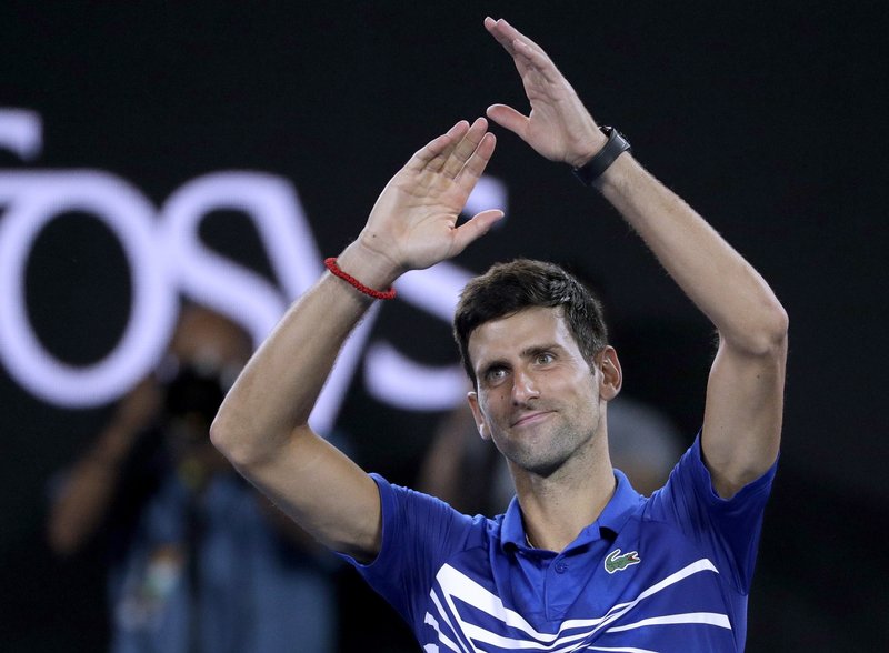 his five set semi final loss to dominic thiem ended his hopes of becoming just the second man in history to hold all four majors at the same time on two occasions photo afp