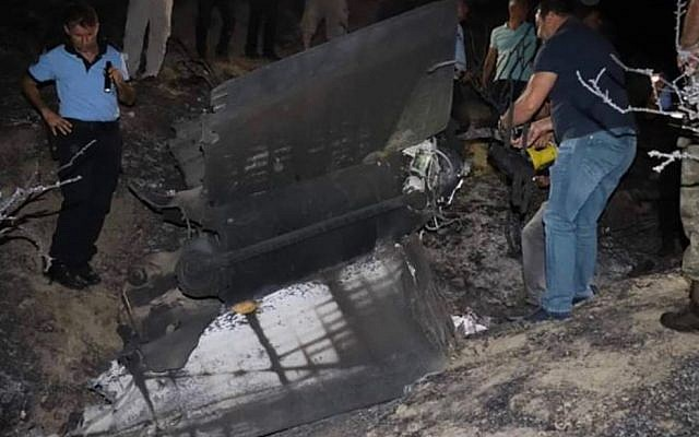 authorities in northern cyprus examine the wreckage of a mystery object that crashed causing a large explosion on july 1 2019 screencapture twitter