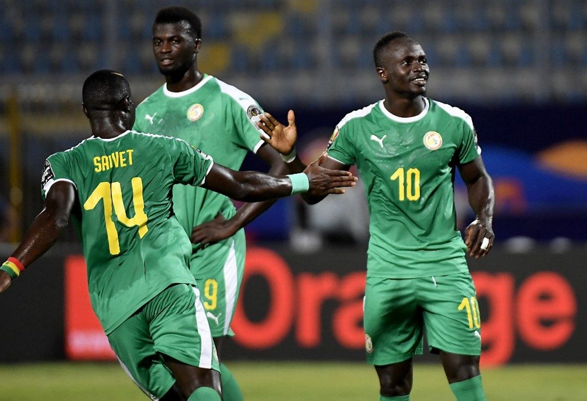 mane misses penalty scores twice as senegal qualify