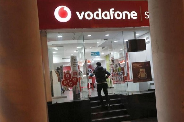a customer enters a vodafone store in new delhi india december 29 2015 photo retuer